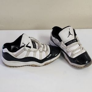 Retro Jordan 11's Low Cut Black and White size little boy's 2.5